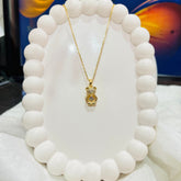 Teddy design pendant with chain.